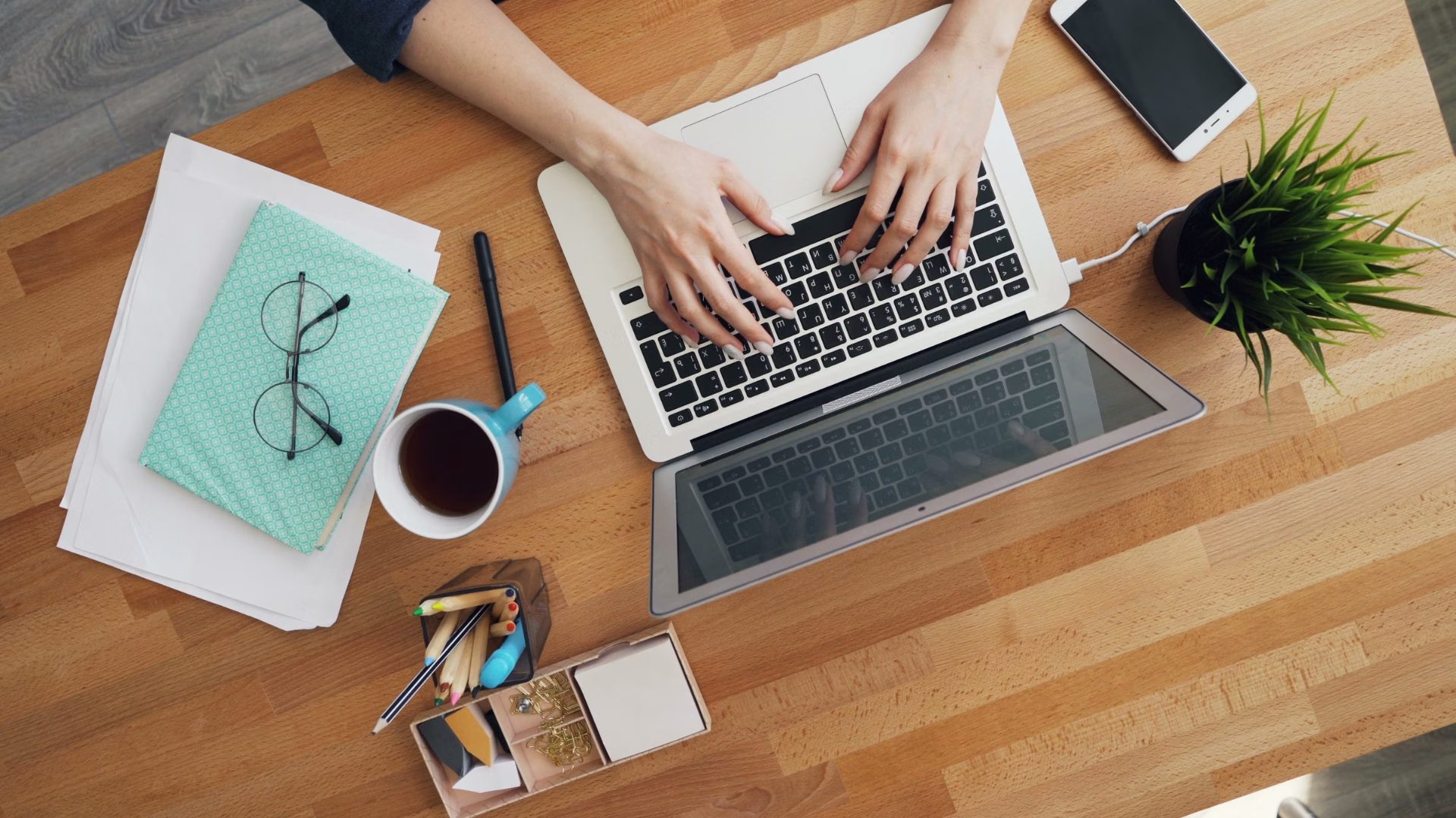 A desk with a laptop